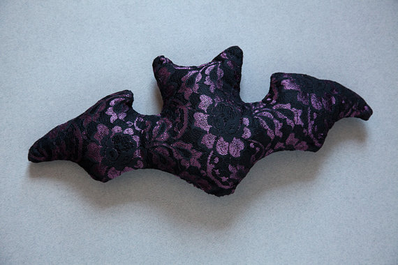 You know you want an adorable bat pillow from Deflated Mouse. Via Darklinks.