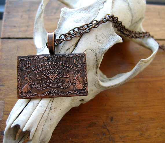 Jackalope Ouija necklace by Cheshworth