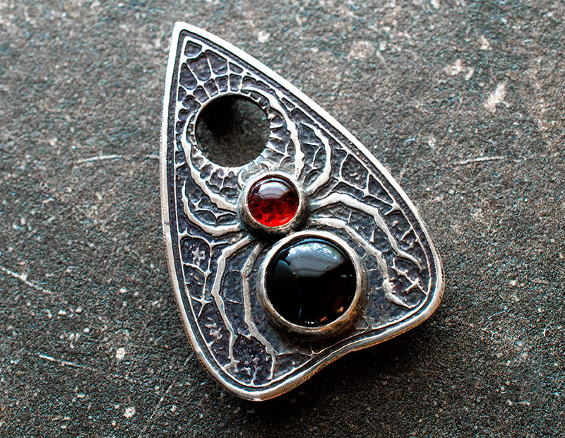 Personal fave--this spider planchette pendant from Argentum Arcana