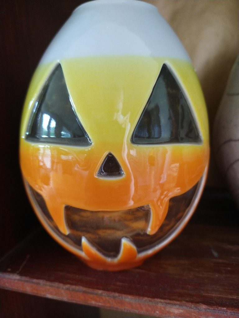 Jack-o-lantern in candy-corn colors.