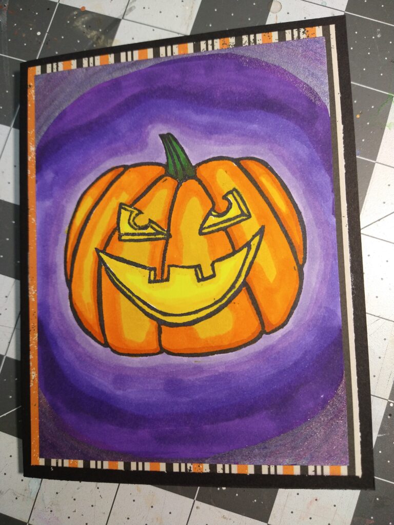 Card with a fierce jack-o-lantern on a purple background.