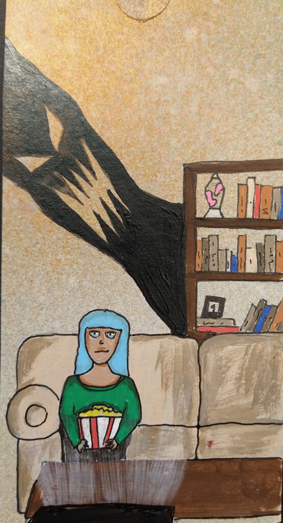 A woman sits watching television on a comfy couch. She is holding a bucket of popcorn. Behind her, beside the bookshelf, a threatening, toothy shadow looms.