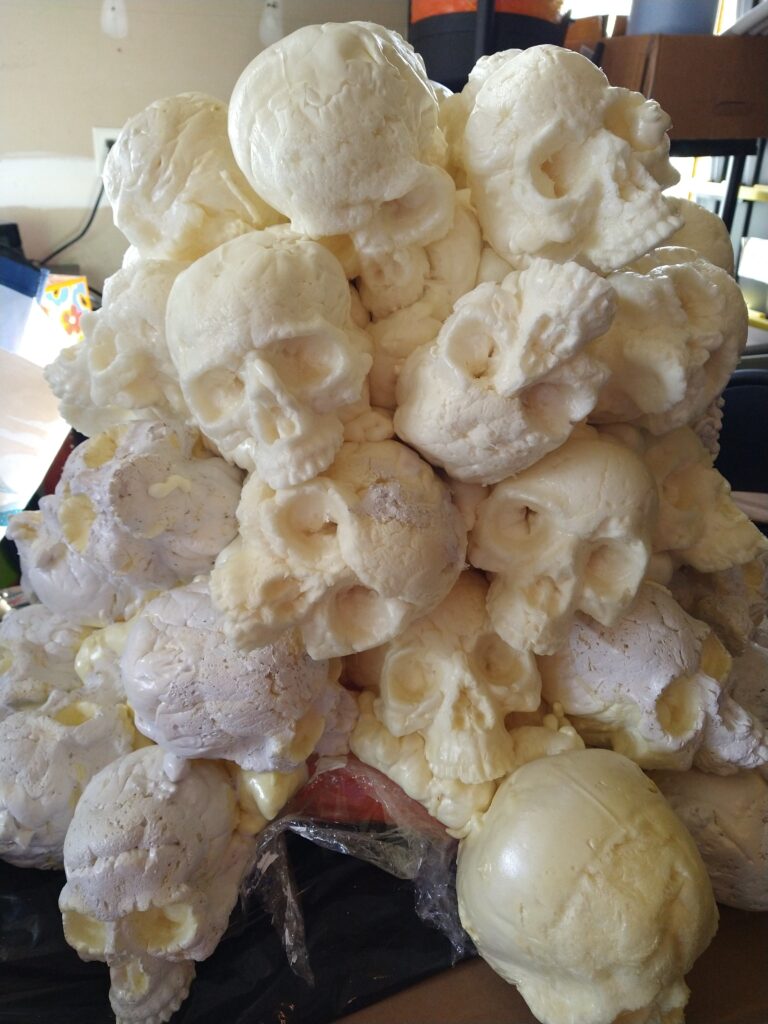 Tower of foam skulls with a gap at the bottom.